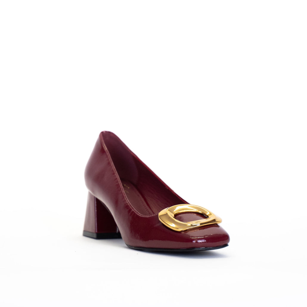 DECOLLETE CON ACCESSORIO DORATO